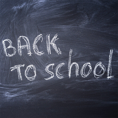 Back to school written on a chalkboard | Pakapalooza
