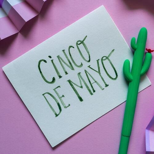 Cinco de Mayo written on white paper | Pakapalooza
