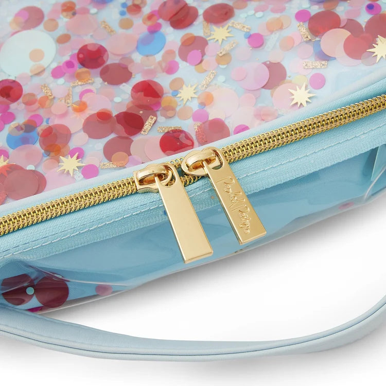 Close-up of the confetti lunchbox’s clear vinyl exterior, carry handle, and gold-tone zipper pulls.