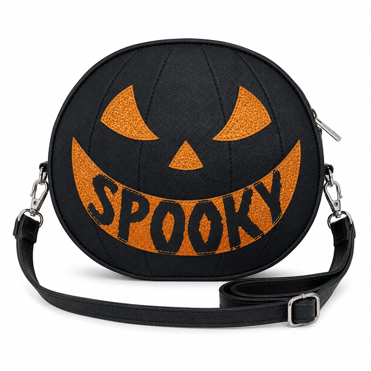 Reversible Jack-O'-Lantern Crossbody Bag showing the black "SPOOKY" pumpkin face with orange glitter accents and adjustable shoulder strap.