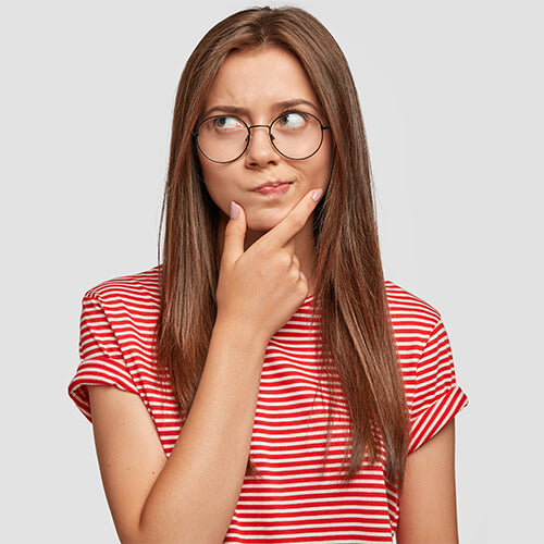 Young girl thinking about clutch bags | Pakapalooza