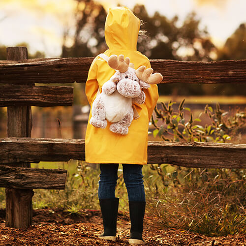 Child wearing Moose Plush Backpack | Pakapalooza