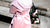 Woman in Pink Robe Carrying Unicorn Bag | Pakapalooza