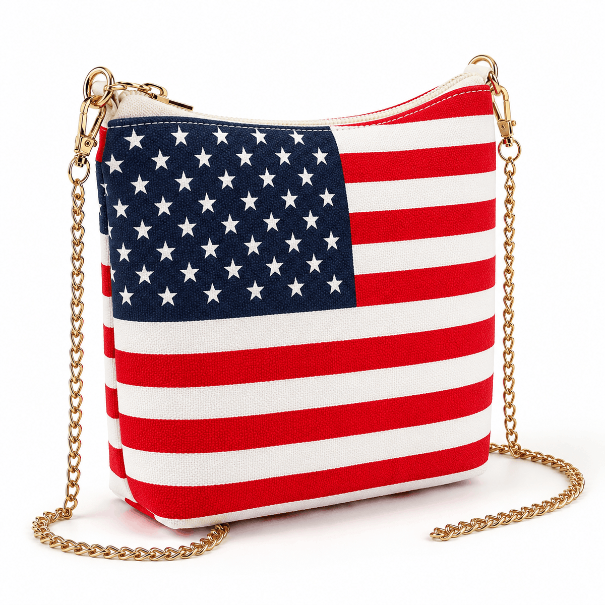 Angled view of an American flag canvas crossbody bag with gold-tone chain strap