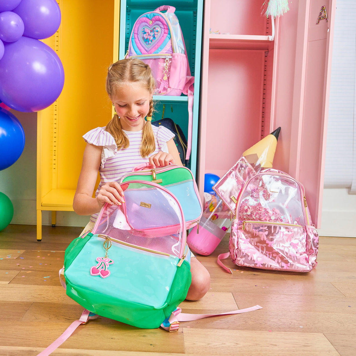 Child packing the Clear Color Block Jelly Backpack in a colorful school setting.