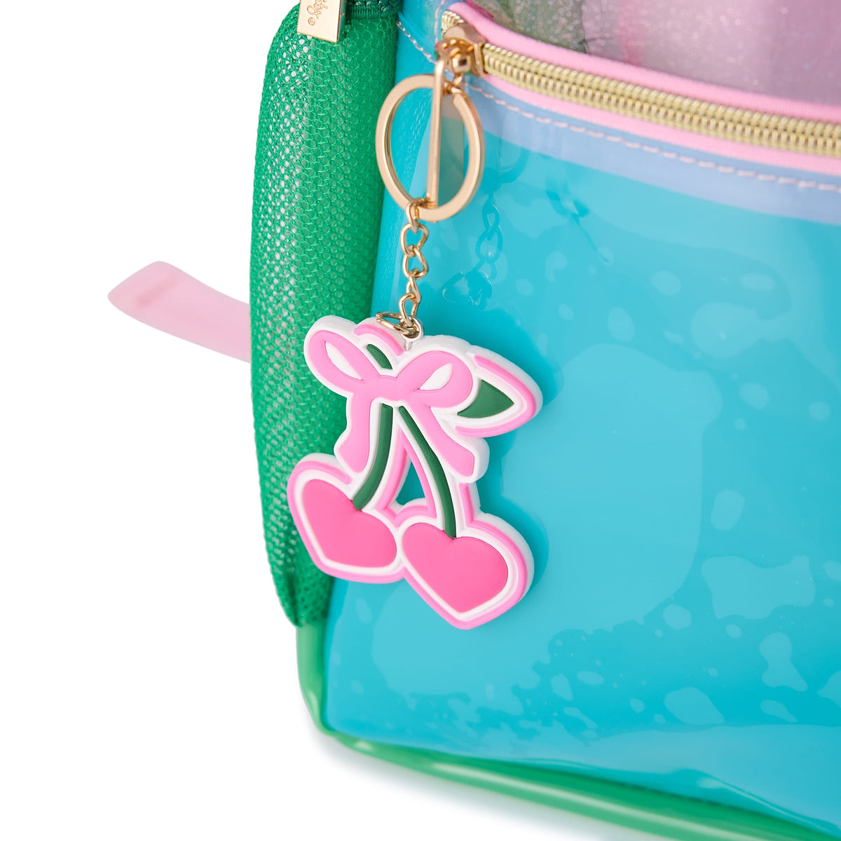 Close-up of the cherry zipper charm and green mesh pocket on the Clear Color Block Jelly Backpack.