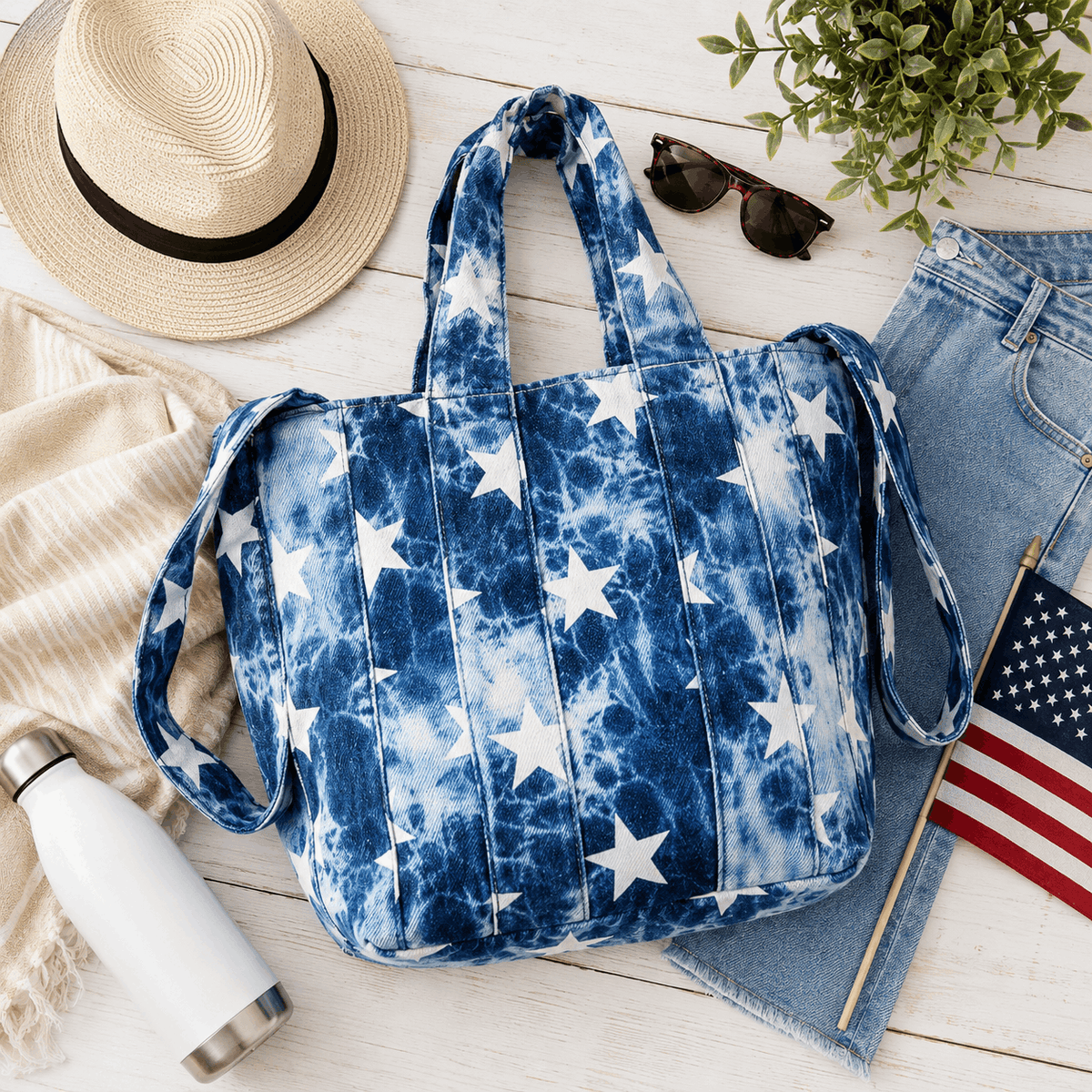 Denim Stars Tote Bag styled with sunglasses, hat, denim, and everyday accessories