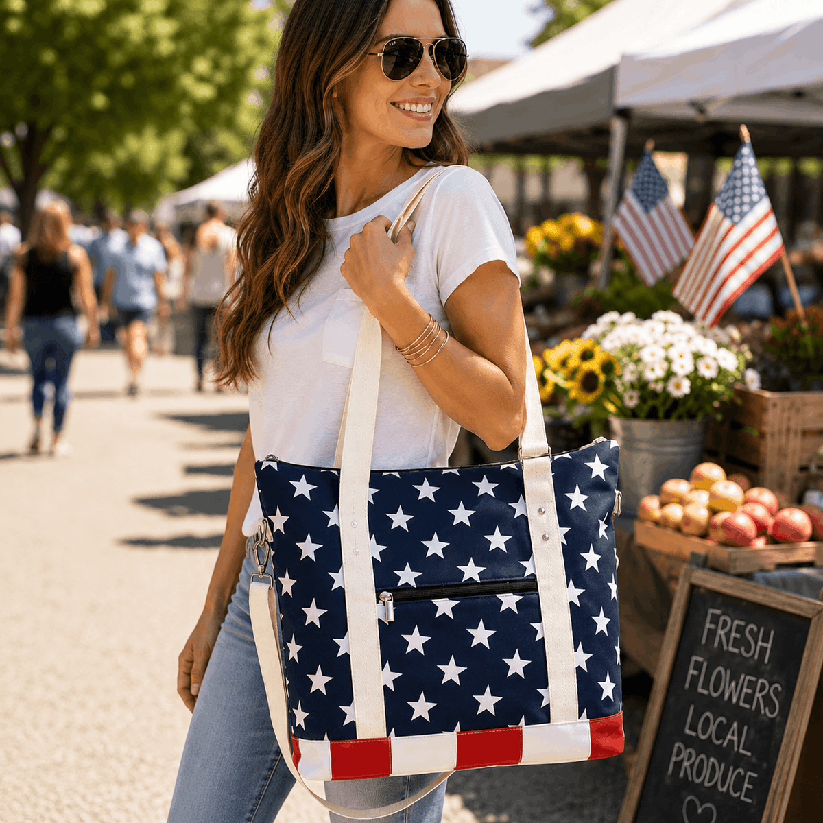 Woman carrying patriotic canvas tote bag while shopping outdoors
