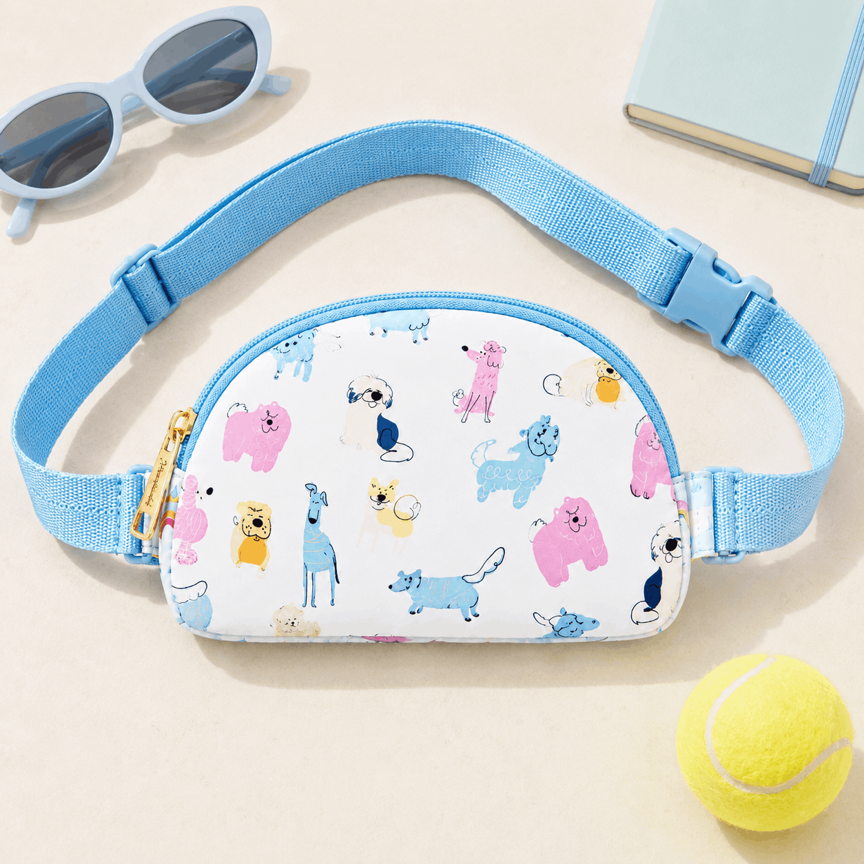 Child wearing the Puppy Pals Belt Bag crossbody at a park