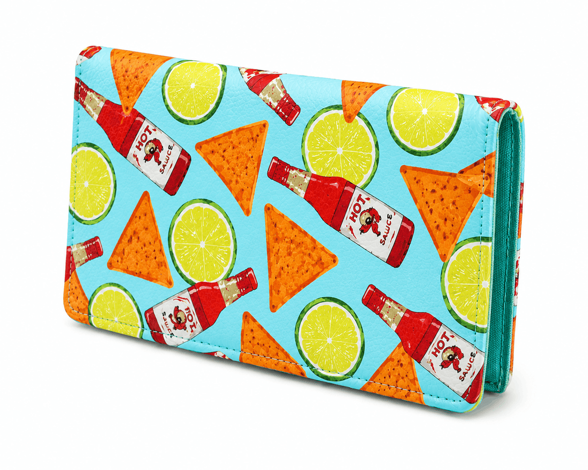 Angled view of the Spicy Fiesta bifold wallet with hot sauce, tortilla chip, and lime pattern